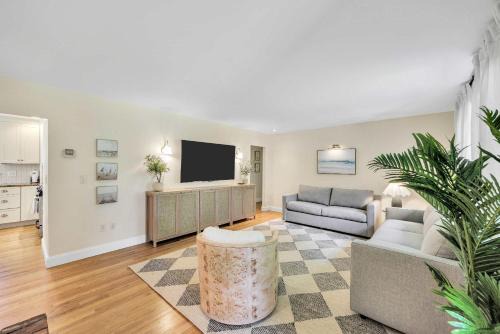 Falmouth House | 1 Story Family Home Half Mile to Beach with Patio , Grill, Office with Twin Beds, Peaceful Wooded Setting, Spacious Driveway, Garden Views, Walk to Shore, Perfect Cape Cod Getaway for Families