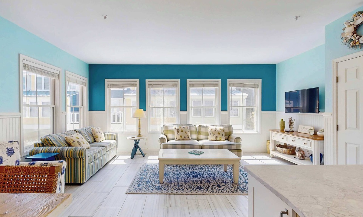 Sunset Island Condo | 4-story townhome with resort pools, beaches, water access, & great location