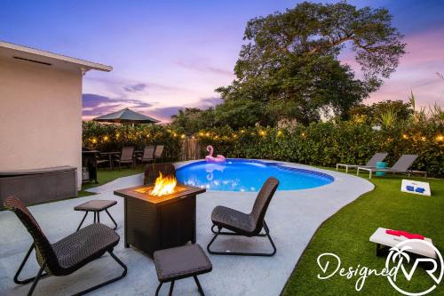 Dania Beach House | 4BR retreat w heated pool backyard BBQ grill