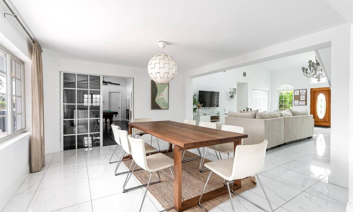 Lighthouse Point House | 4BR Tiki Villa, Pool, Spa, Dock & Private Waterfront