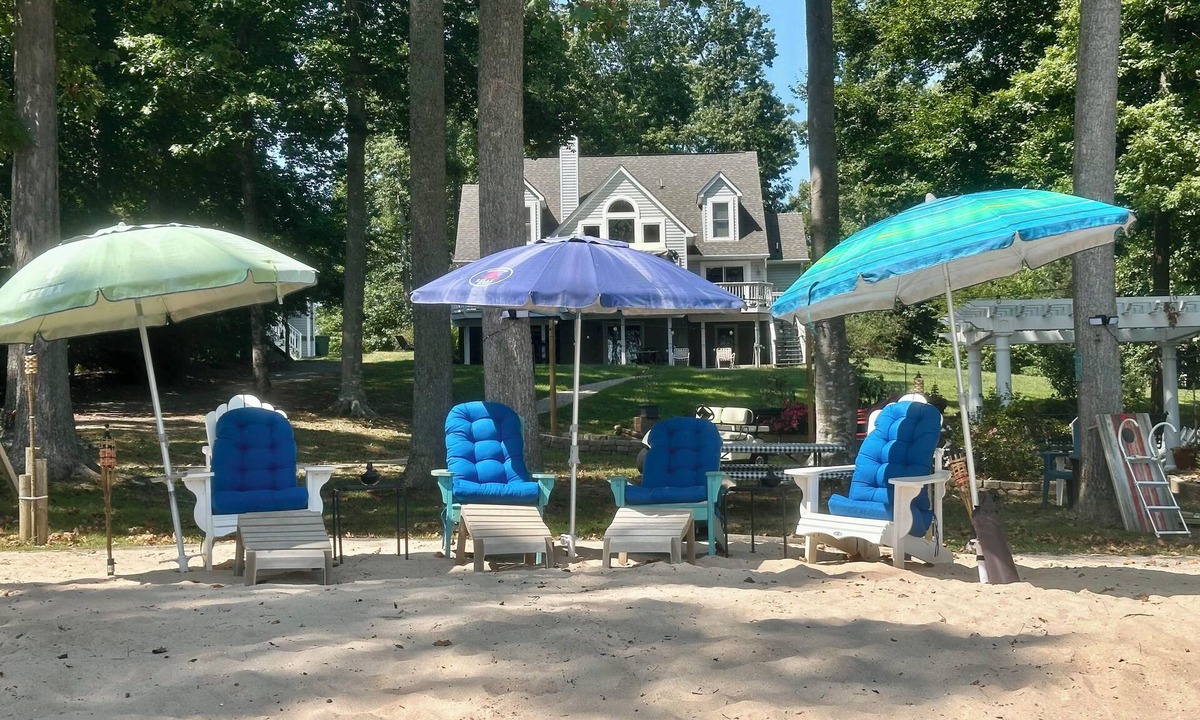 Sandy Point House | ALL SEASON RETREAT! Warm Waters, 2 Firepits, Cozy Boathouse! Indoor Fireplace!