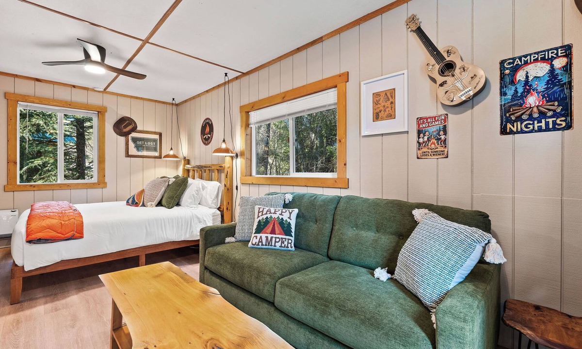 Martin City Cabin | Alpenglow blends rustic Montana character with clean, modern touches. Natural wood, warm textiles, and curated accents create a calm retreat. Unwind after a long day in the park w/100% cotton sheets, a good book, or swap stories at the fire pit.