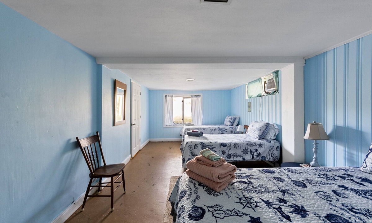 Cottage Line House | Beach Front On The Bay In Our Rustic Beach 4 Bedroom Cottage by RedAwning