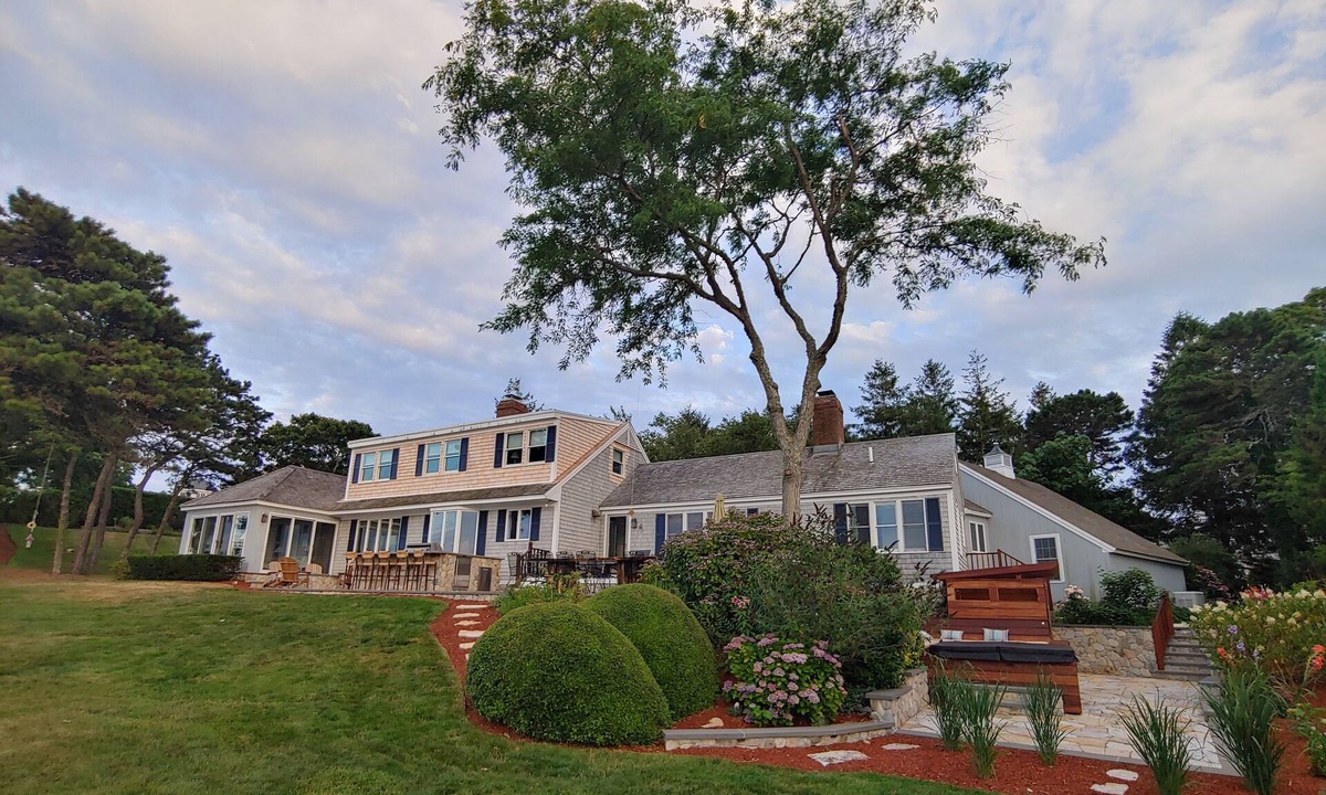 North Chatham House | Beachfront Cape w/ Dock Hot Tub Fire Pit Outdoor Kitchen Boats Kayaks - Pets Ok!