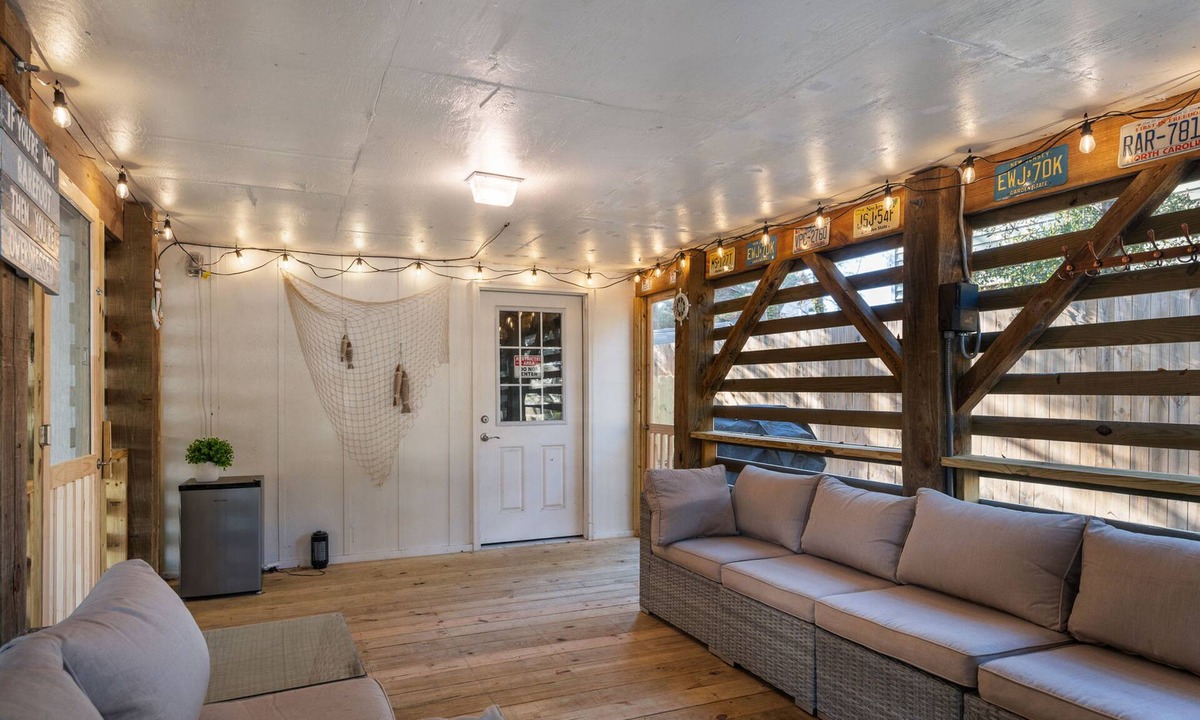 Colington Harbour House | Boho-chic Banks getaway with luxe interior, hot tub, AC, & W/D - dog friendly