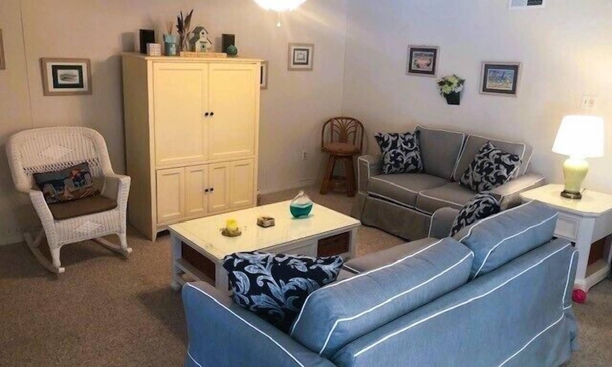 North Ocean City Condo | Charming 2 bed 2 bath condo featuring the ultimate private setting with wooded views that you can enjoy from your spacious deck.