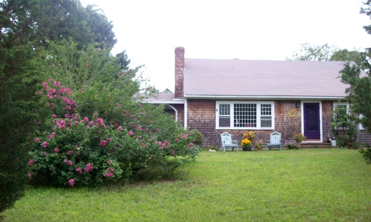 Lagoon Heights House | Charming, gracious cape 3 minute walk to private beach on Lagoon. Dog-friendly!