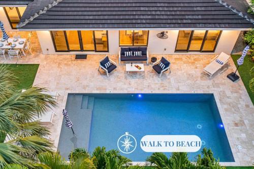 Harbour Inlet House | Coastal Style Haven Walk To Beach Heated Pool Tranquility Manatee Ranch Key RESlDENCES