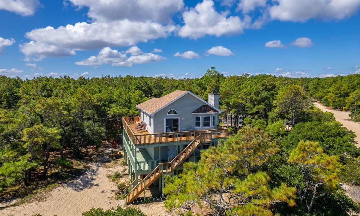 Carova Beach House | Colorful Carova Beach Oasis. Pet friendly with a Pool! 4x4