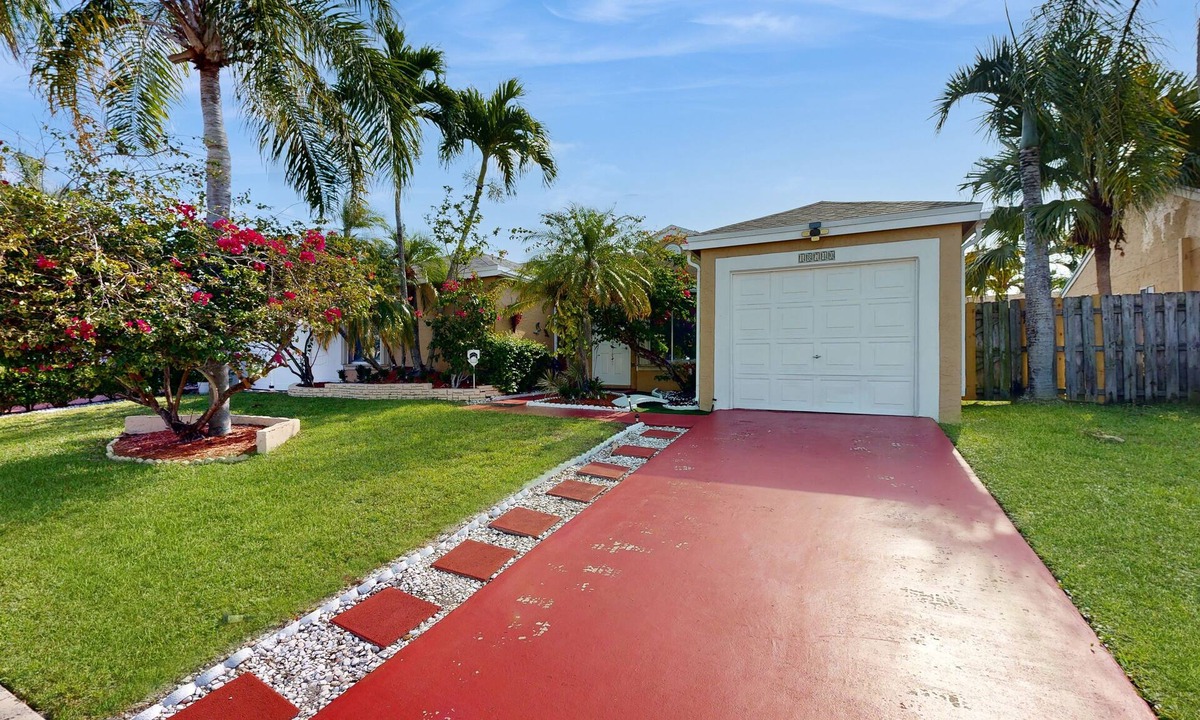 Whisper Walk House | Colorful dog-friendly home with pool, grill, work desks, internet, AC, & W/D