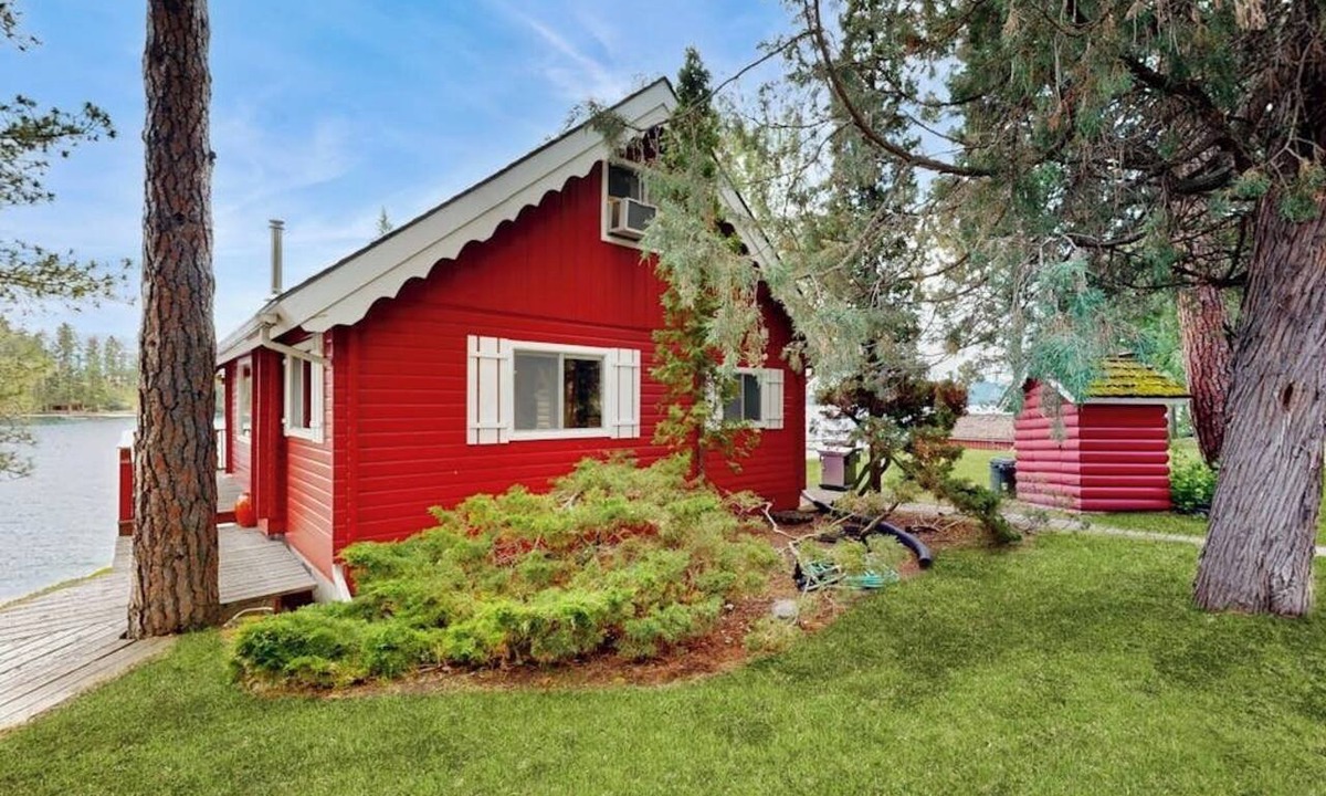 Rollins Cabin | Cozy lakefront log cabin with lake views, vintage decor, & dock