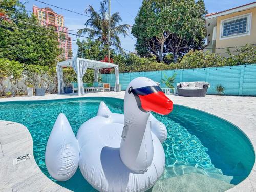 Dolphin Isles Villa | Designer Beach House with Heated Pool, Walk to Sand