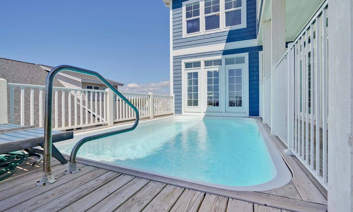 Long Beach House | Discover oceanfront bliss at 7th Heaven in Oak Island, NC—spacious 7BR, sleeps 24!