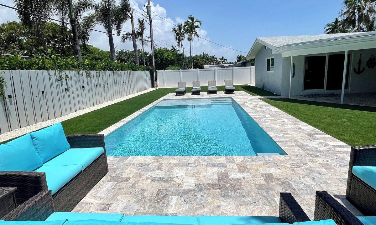 Coral Heights House | Escape in Backyard Oasis! Saltwater heated pool, 2 miles to the beach!