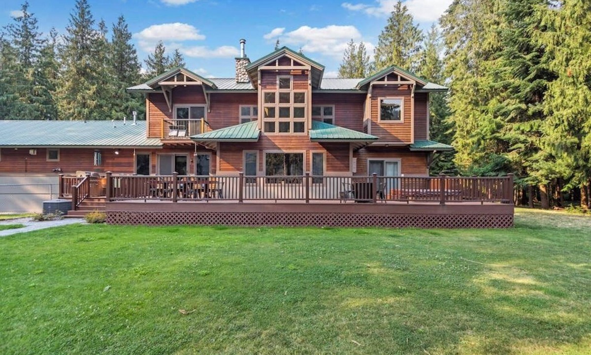 Clark Fork House | Expansive Riverfront Lodge with Dock, Game Room, Bar & Spacious Deck!