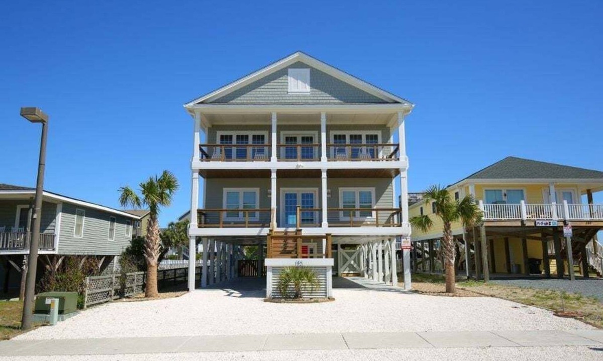 Holden Beach House | Experience Absolute Paradise: a spacious 5-bedroom home steps from Holden Beach.