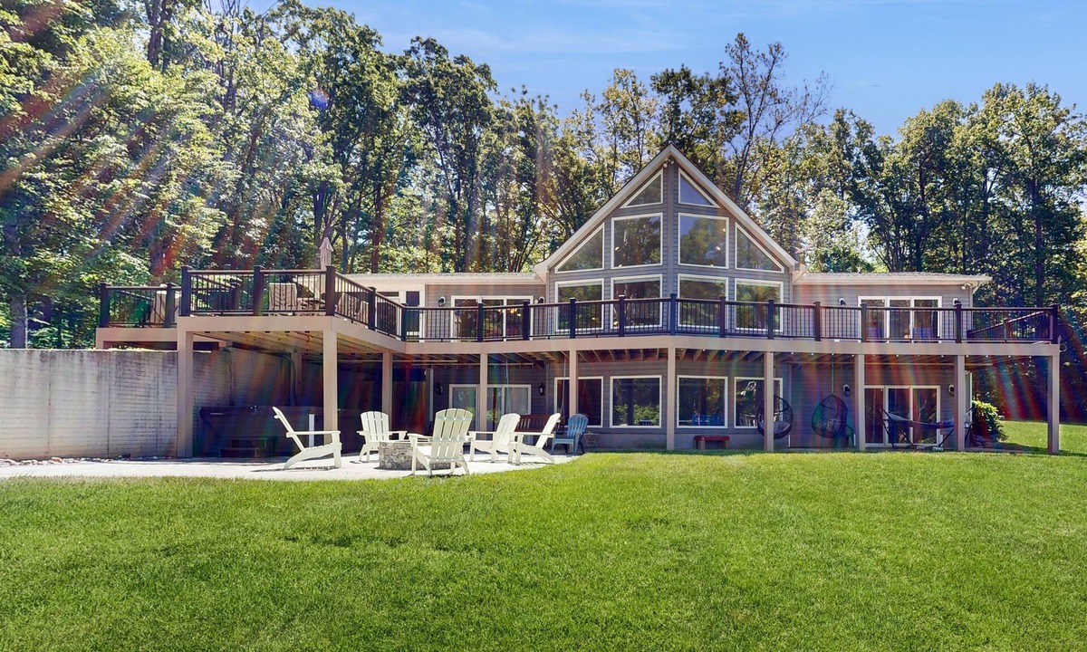Bumpass House | Exquisite dog-friendly home with kayaks, pool table, hot tub, & washer/dryer