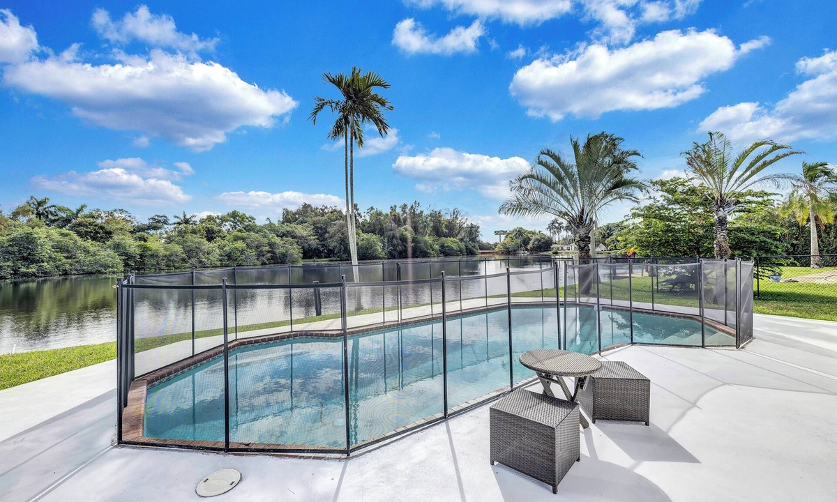 North Central Hollywood House | HEATED Pool Home on Lake Hard Rock Guitar Hotel Beach Airport