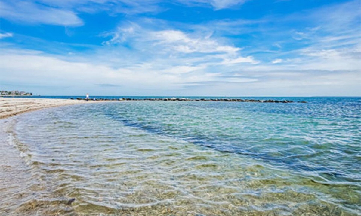 Falmouth Condo | Hot tub on your deck and beach across the street.Relax