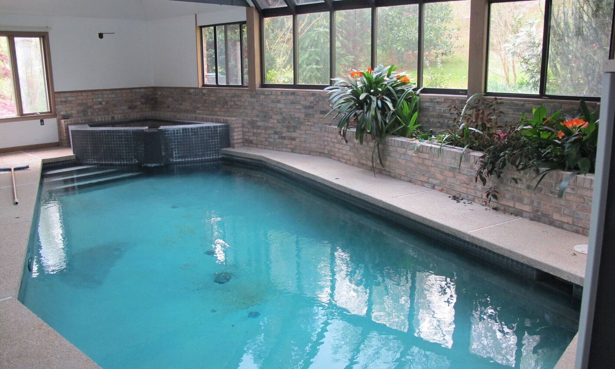 Chesapeake Beach House | Indoor pool and spa in contemporary French home secluded in surrounding woods
