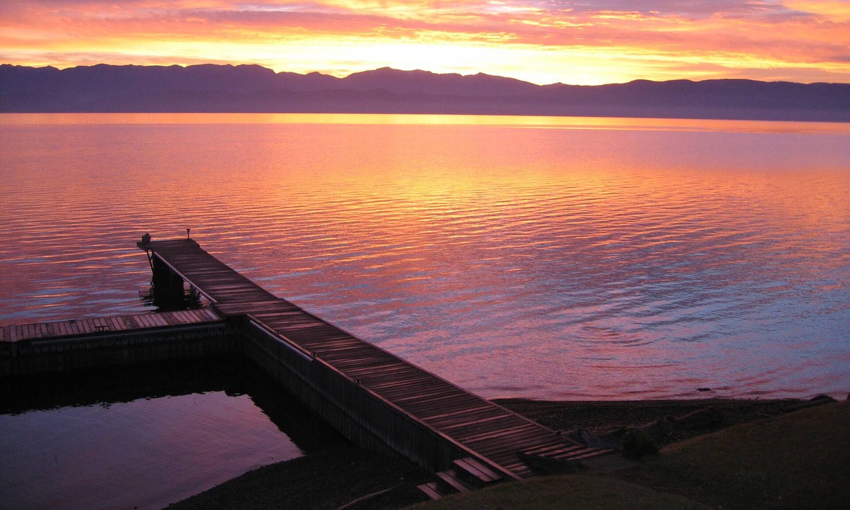 Lakeside House | Just steps from Flathead Lake's shore, this fine home offers dock, views, value.
