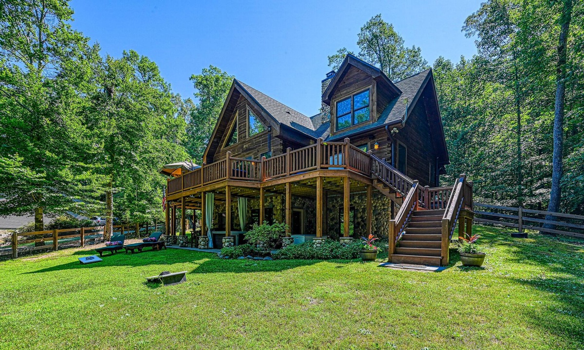 Bumpass Cabin | Luxurious lakefront cabin with hot tub, game room, & washer/dryer- dog friendly