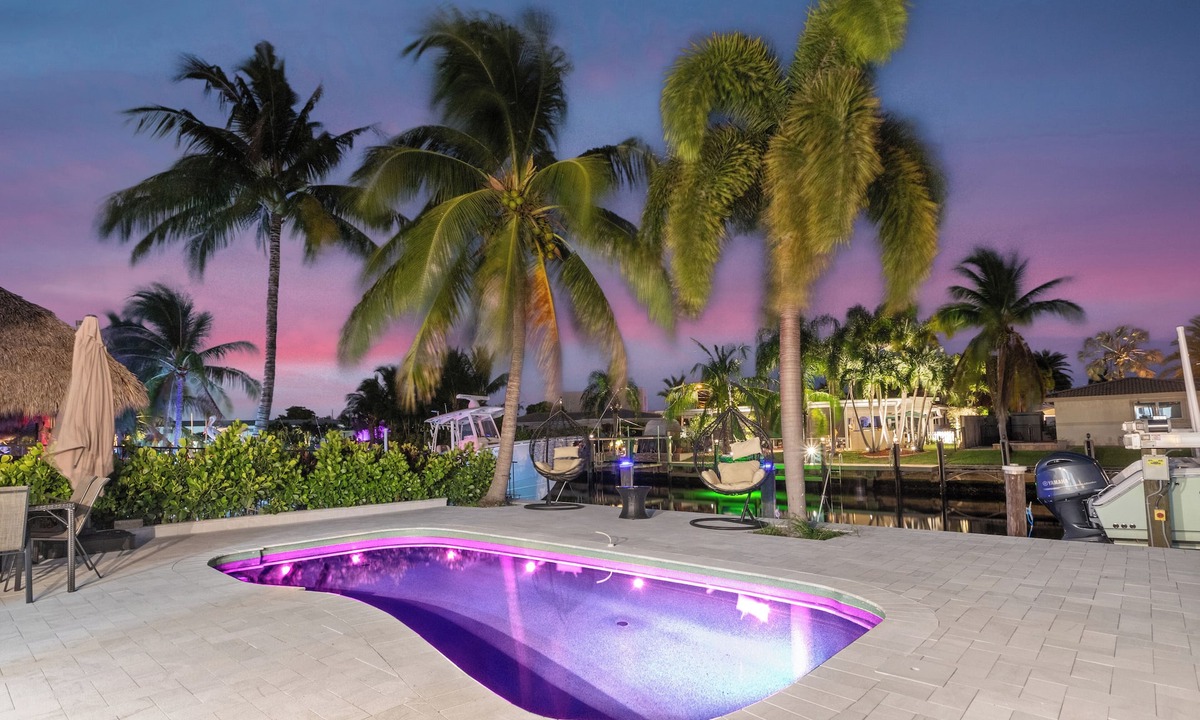 Garden Isles House | Luxurious Waterfront Ocean Access Heated Pool WD Wifi 75Ft Dock Bring Your Boat