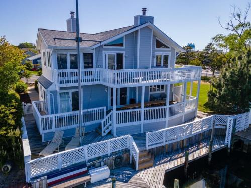 Caine Woods House | Luxury Waterfront Villa Dock Game Room Sunset Views