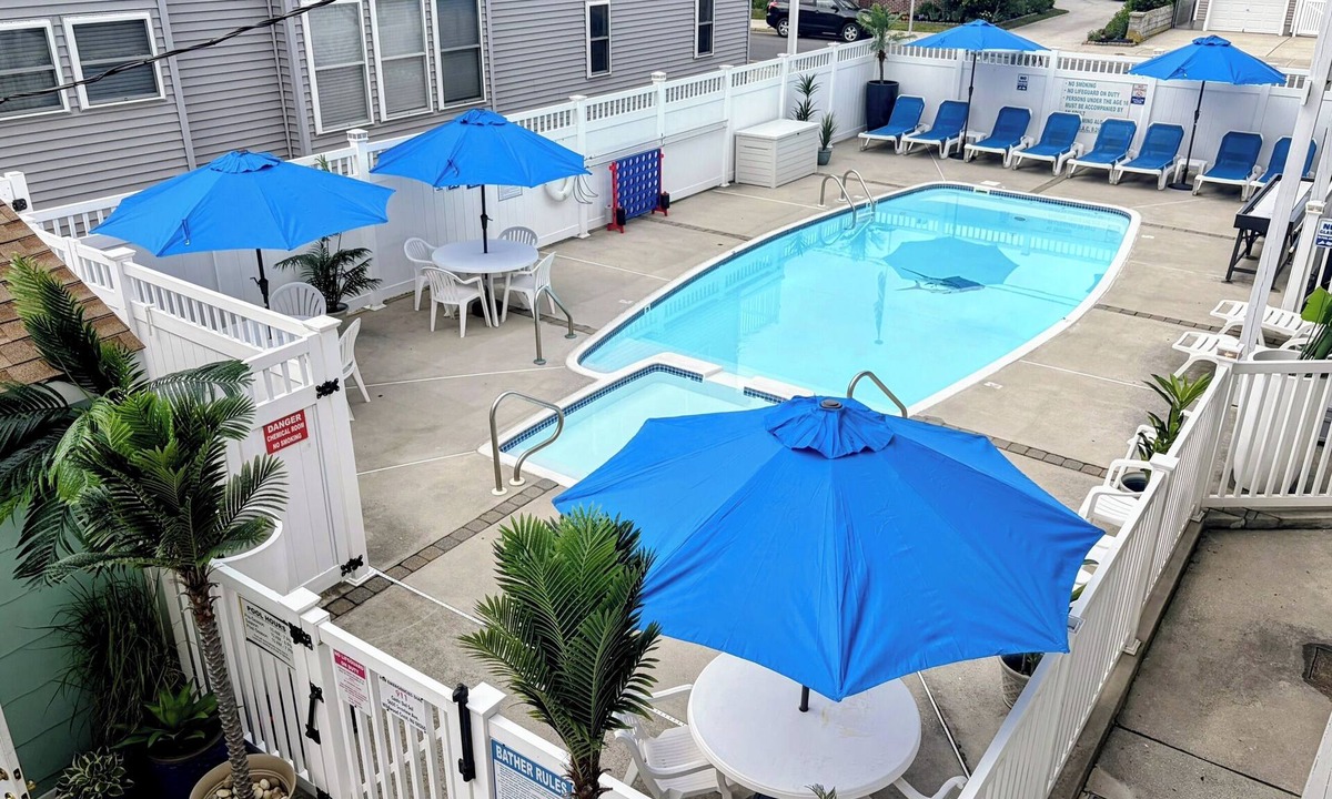 Wildwood Crest Condo | Ocean breezes, porch dining, and your favorite drink await
