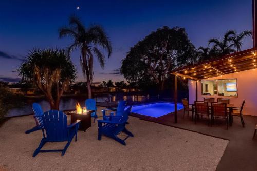 Wilton Manors Villa | Relaxing Waterfront 3BR 2BA with Pool Fire Pit BBQ Hammock Tree Swing