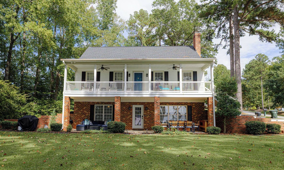 Henrico House | Serene Lakefront Escape with Sunset Views, Private Boathouse, and Endless Fun!