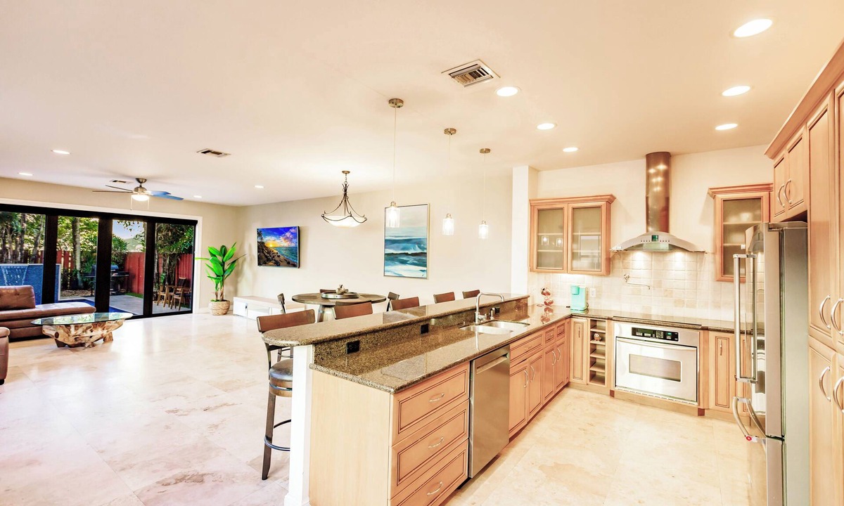 Tarpon River House | Spacious townhouse in downtown with rooftop terrace, heated pool, and king bed