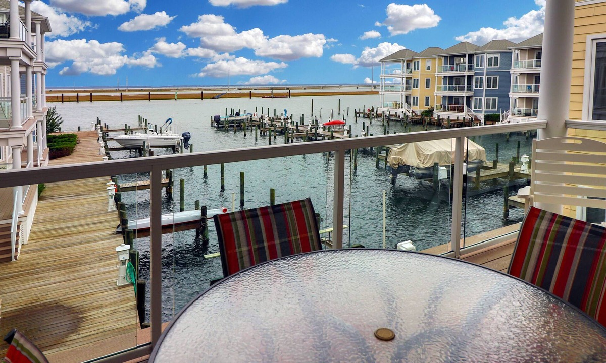 Chincoteague House | Sunset Bay Villa 208 | Luxury Marina Villa w/Private Boat Slip, Deck, Pool + Pet Friendly