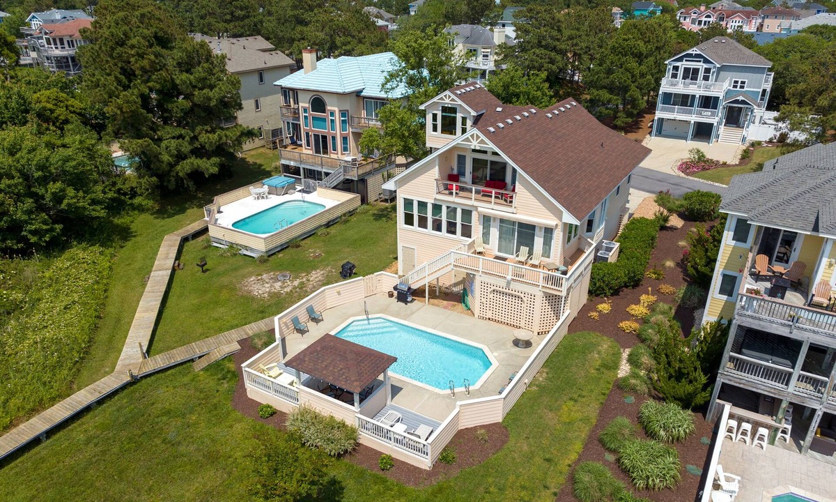 Monteray Shores House | Sunset Thrill: Soundfront | Pool | Shared Dock