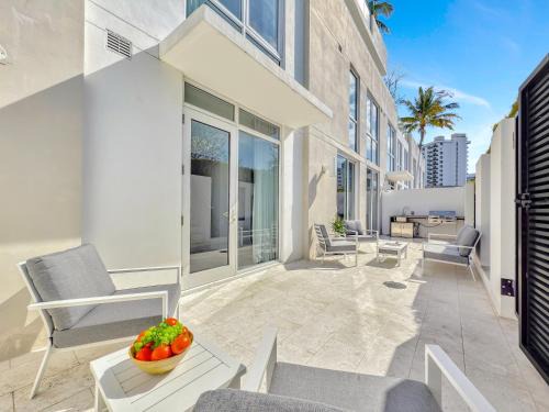 Central Beach House | Tiffany Tides - Resort-Style Beach Townhome - Gym, Rooftop Pool and Sauna