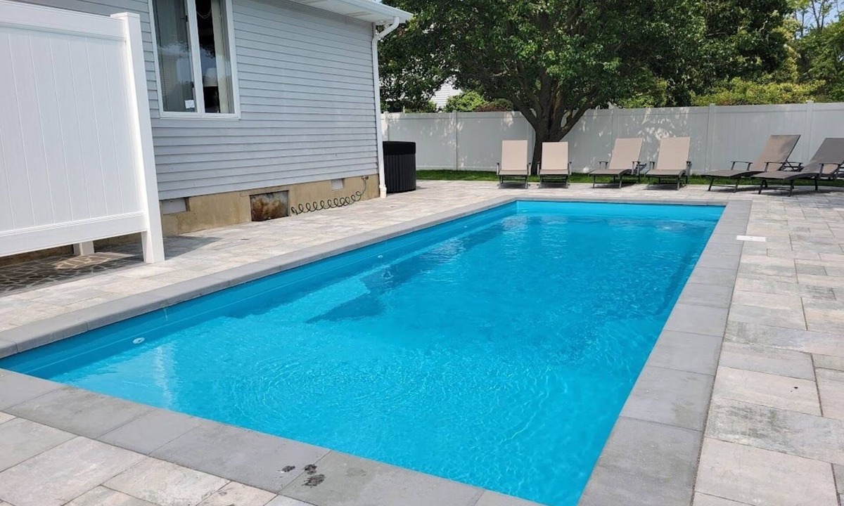 Seabreeze House | WALK to Beach, Town of Dewey w/LARGE Heated POOL thru Oct, HOT TUB and fire pit!