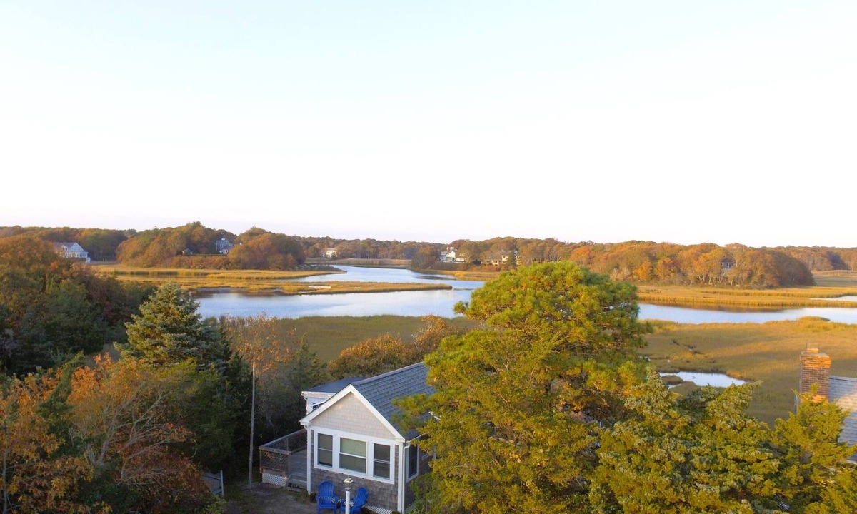 Centerville Cottage | Waterfront! Riverfront delight. 2 BR, private, decks. Steps to Craigville Beach