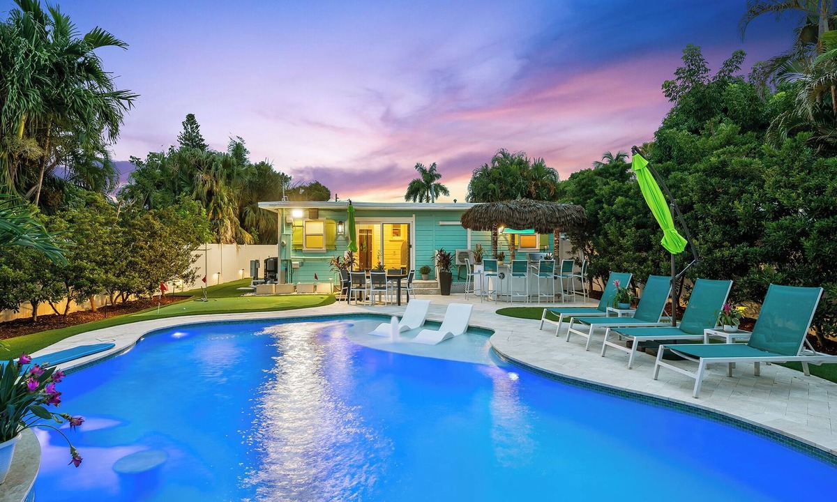Middle River Terrace House | Welcome to the Bohemian, a Heated Salt-Water Tropical Pool Home!