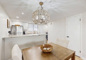 Updated coastal getaway with pool - walk to beach, dining, shops & entertainment