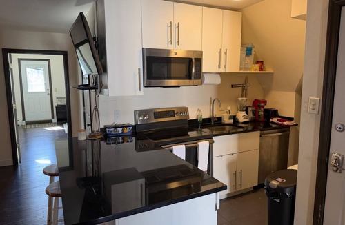 Weehawken Apartment | 10m to NYC: 25ft Ceiling Penthouse, Skyline Balcony & "Treehouse" Loft