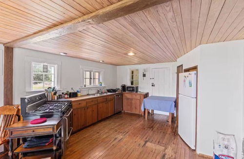 North House | 1899 Old Log Cabin School House w/10 acres on the Chesapeake Bay with Beach