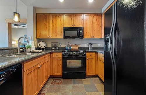 Whitefish Condo | 2 bedroom with incredible views and direct ski in and out! Hot tub/underground parking/gym