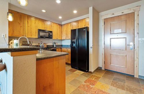 Whitefish Condo | 2 bedroom with incredible views and direct ski in and out! Hot tub/underground parking/gym