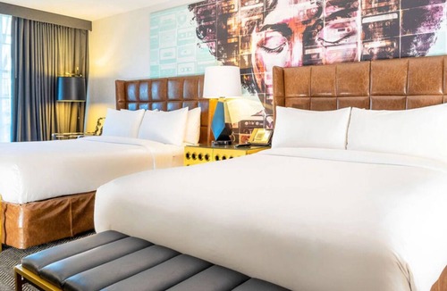 Norma Triangle Hotel | 2 Modern Pet-Friendly Sanctuary w/Rooftop Pool Lounge & Skyline Evenings