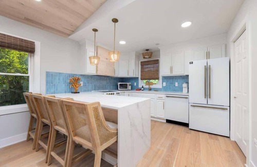 Colington House | 2 Private Living Spaces, 2 Hot Tubs and Bikes!