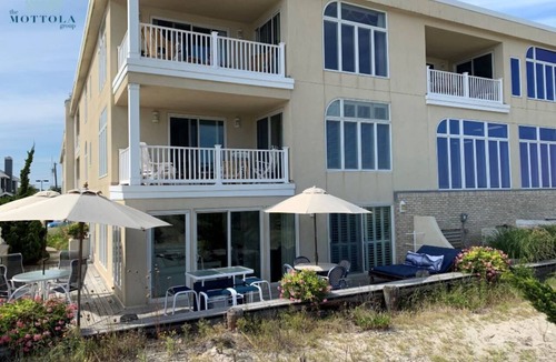 Stone Harbor Condo | 2-WEEK MINIMUM - Enjoy the sounds of the waves from this ground floor unit - Luxury Condo living in the heart of Stone Harbor.