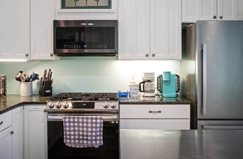 Louisa House | 3 Acre 5BR Resort: private pool, hot tub boat dock