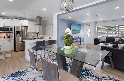 Coral Heights House | 4 BED/ 3 BATH HOME WITH INDOOR / OUTDOOR LIVING, HEATED POOL- HOT TUB! DISCOUNT!