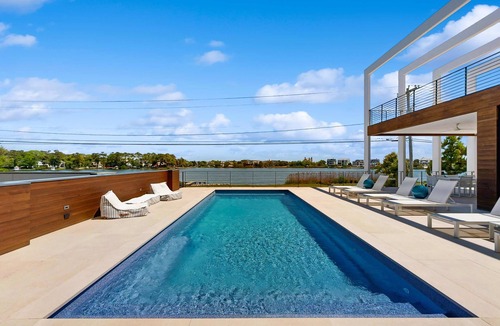 Rehoboth Beach House | 7 Bedroom Waterfront Rehoboth beach house with private pool