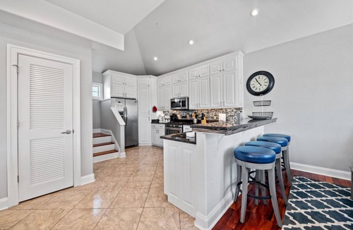 Northeast Virginia Beach House | 7 beds! One block from new SURF Wave Pool and beach! Bikes included!